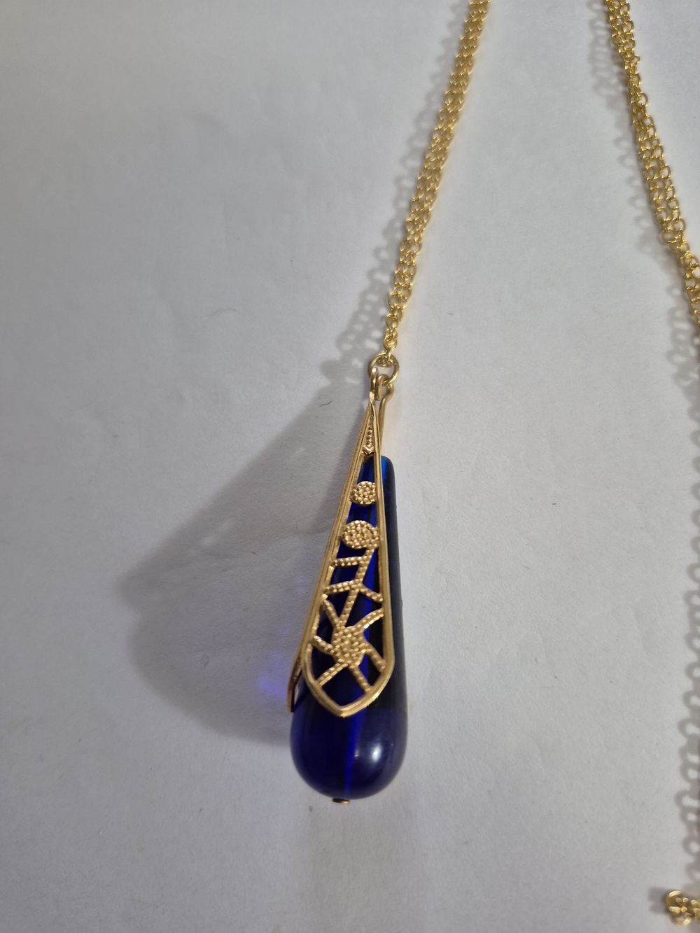 Gold Filigree Teardrop Necklace with Deep Blue Pendant